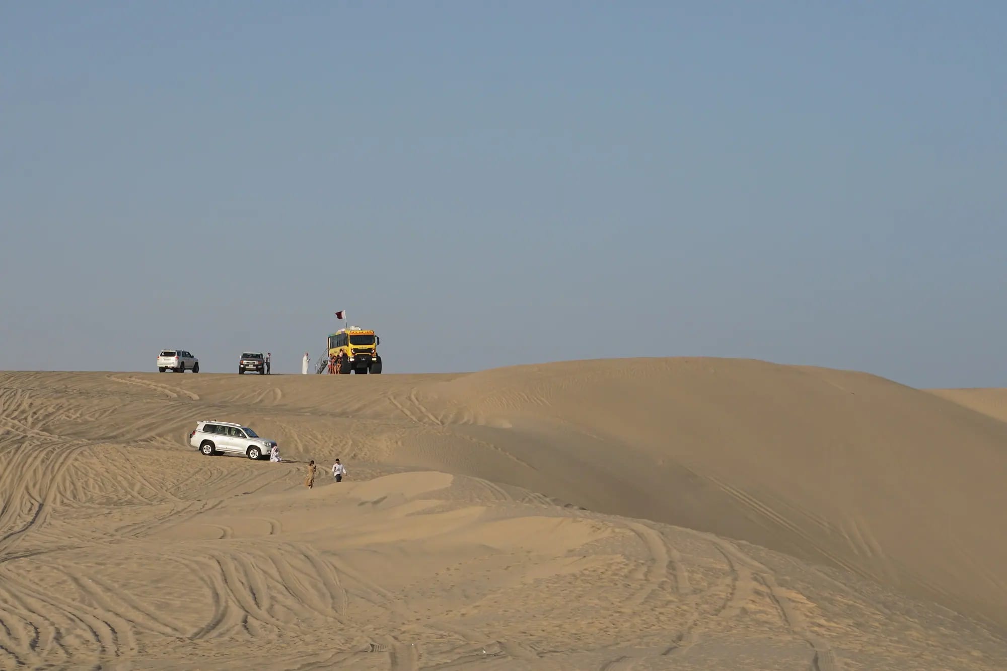 4x4 convoy crossing the Sealine dunes, Qatar