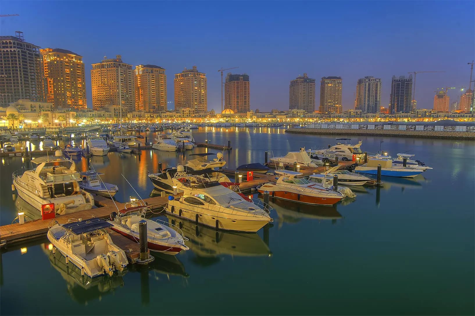 Yachts in The Pearl-Qatar marina at dusk